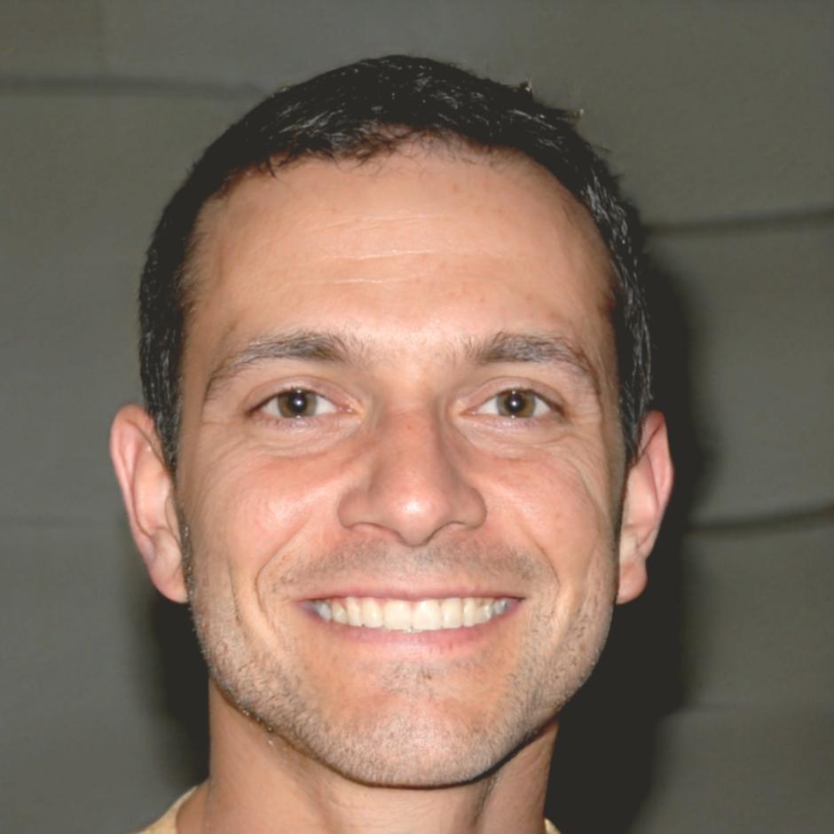 Instructor Tavish Morrissey reviewing student work